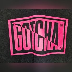Men's Gotcha T-shirt size medium in black and neon pink.
